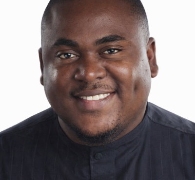 Confident portrait in pinstriped shirt